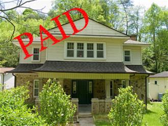 pay off mortgage - house with paid stamped in front